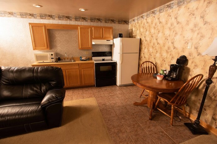 Imagen de la habitación del Hotel Blue Spruce Motel. Foto 17