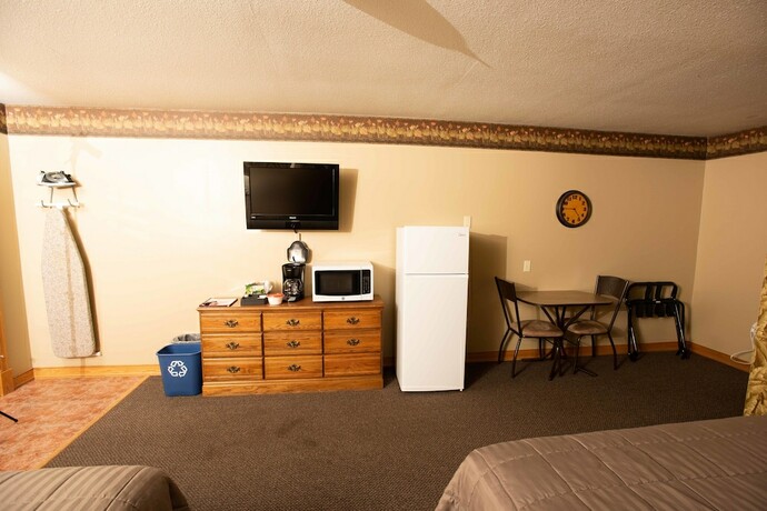 Imagen de la habitación del Hotel Blue Spruce Motel. Foto 18