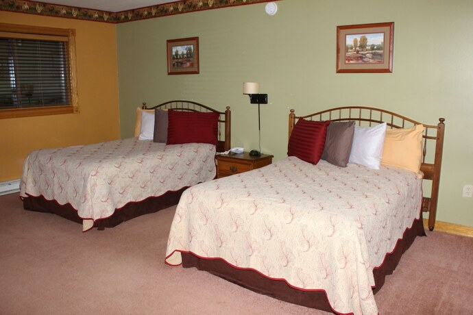 Imagen de la habitación del Hotel Blue Spruce Motel. Foto 19
