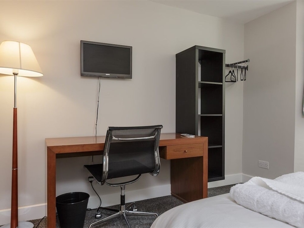 Imagen de la habitación del Hotel Blue Star House. Foto 13