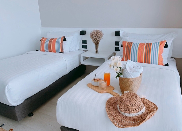 Imagen de la habitación del Hotel Blue Tao Beach. Foto 17