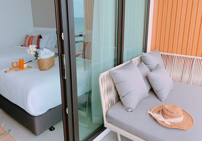 Imagen de la habitación del Hotel Blue Tao Beach. Foto 18