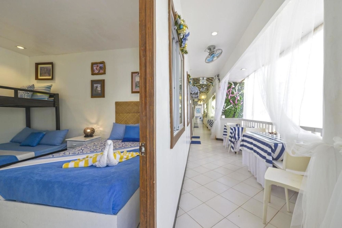 Imagen de la habitación del Hotel Blue Veranda Suites At Boracay. Foto 9