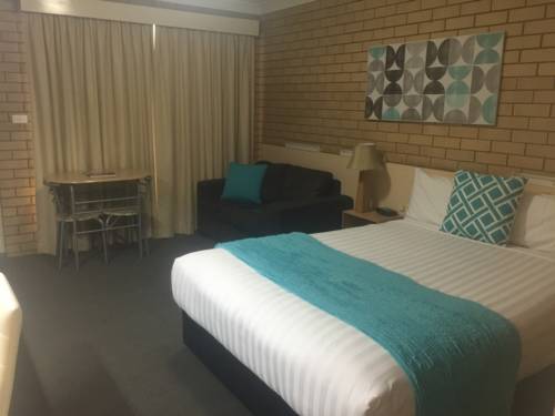 Imagen de la habitación del Hotel Blue Violet Motor Inn. Foto 1