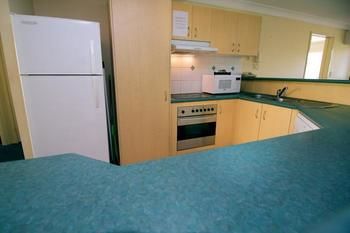 Imagen de la habitación del Hotel Blue Water Bay Luxury Villas. Foto 2