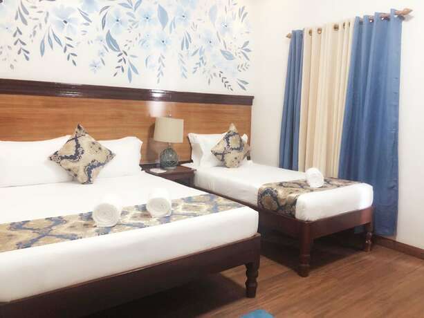 Imagen de la habitación del Hotel Blue Waters Inn Coron. Foto 14