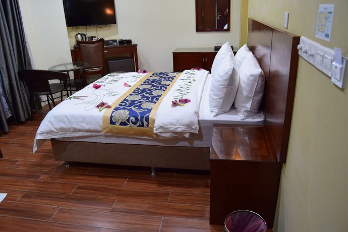 Imagen de la habitación del Hotel Blue Wave Guest House. Foto 8