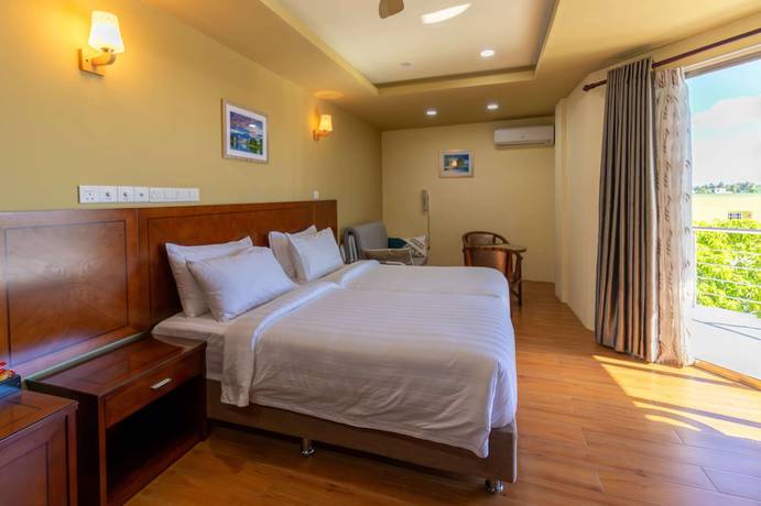 Imagen de la habitación del Hotel Blue Wave Guest House. Foto 9