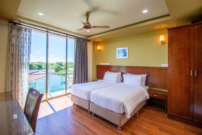 Imagen de la habitación del Hotel Blue Wave Guest House. Foto 10