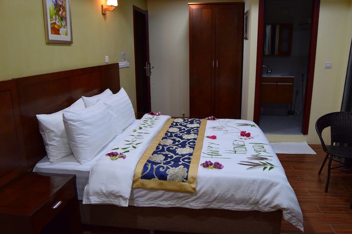 Imagen de la habitación del Hotel Blue Wave Guest House. Foto 12