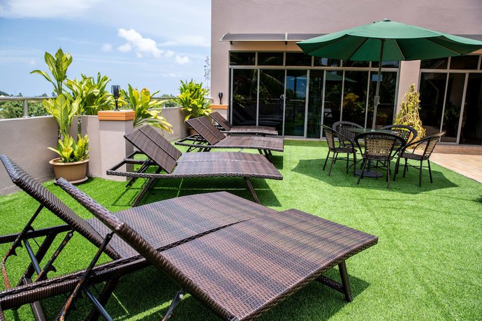 Imagen de la habitación del Hotel Blue Wave Guest House. Foto 13