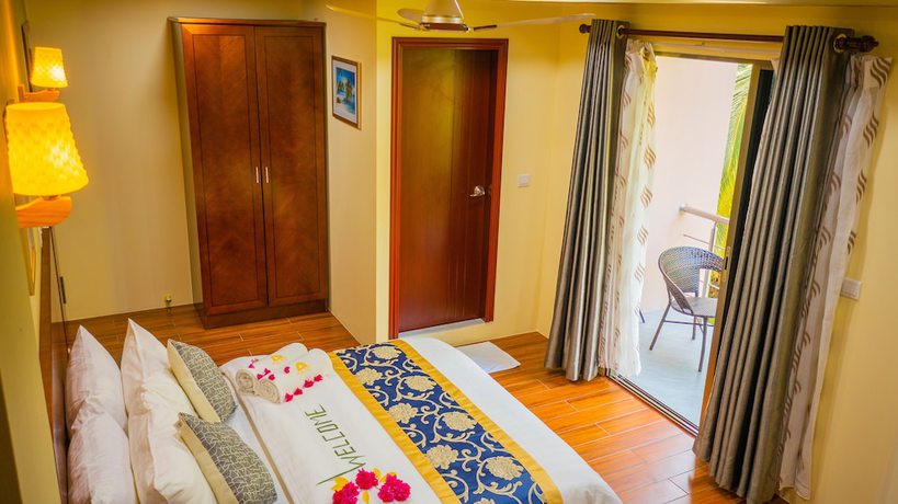 Imagen de la habitación del Hotel Blue Wave Guest House. Foto 15