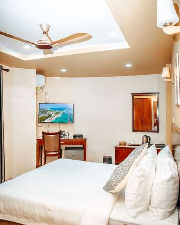 Imagen de la habitación del Hotel Blue Wave Guest House. Foto 16