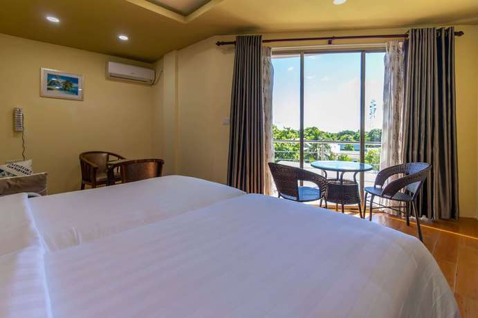 Imagen de la habitación del Hotel Blue Wave Guest House. Foto 18