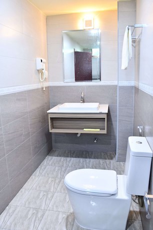 Imagen de la habitación del Hotel Blue Wave Guest House. Foto 19