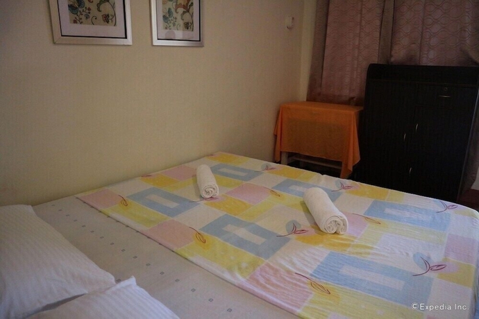 Imagen de la habitación del Hotel Blue Wave Inn Beach Resort and Restaurant. Foto 3
