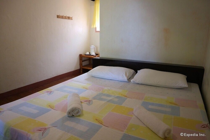 Imagen de la habitación del Hotel Blue Wave Inn Beach Resort and Restaurant. Foto 6
