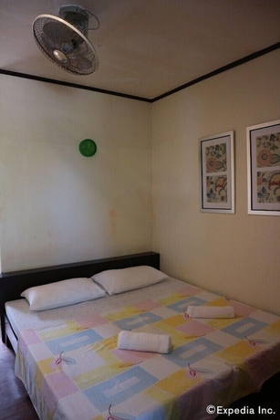 Imagen de la habitación del Hotel Blue Wave Inn Beach Resort and Restaurant. Foto 7