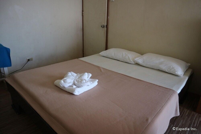 Imagen de la habitación del Hotel Blue Wave Inn Beach Resort and Restaurant. Foto 8