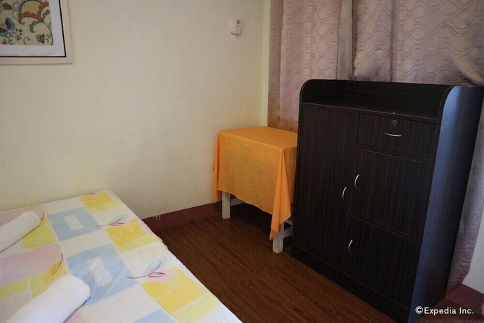 Imagen de la habitación del Hotel Blue Wave Inn Beach Resort and Restaurant. Foto 9