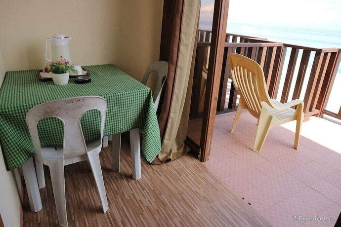 Imagen de la habitación del Hotel Blue Wave Inn Beach Resort and Restaurant. Foto 10