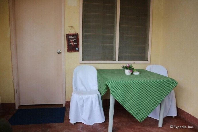 Imagen de la habitación del Hotel Blue Wave Inn Beach Resort and Restaurant. Foto 11