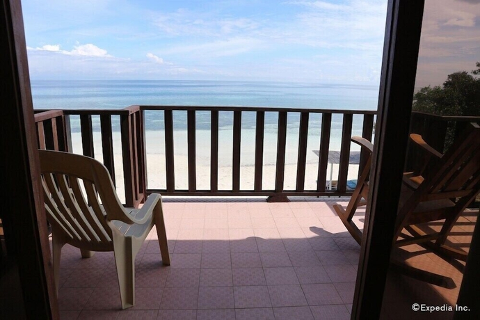 Imagen de la habitación del Hotel Blue Wave Inn Beach Resort and Restaurant. Foto 12