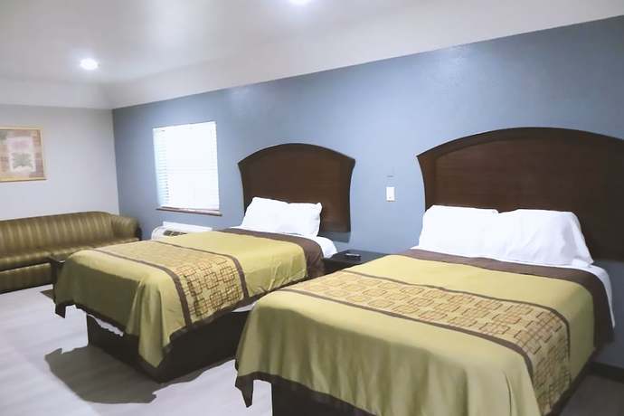 Imagen de la habitación del Hotel Blue Way Inn and Suites By Jasper Houston. Foto 9