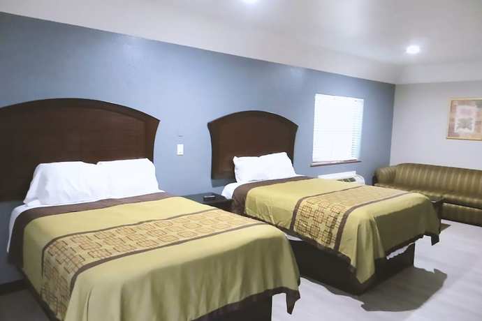 Imagen de la habitación del Hotel Blue Way Inn and Suites By Jasper Houston. Foto 12