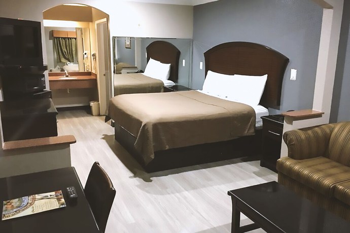 Imagen de la habitación del Hotel Blue Way Inn and Suites By Jasper Houston. Foto 14