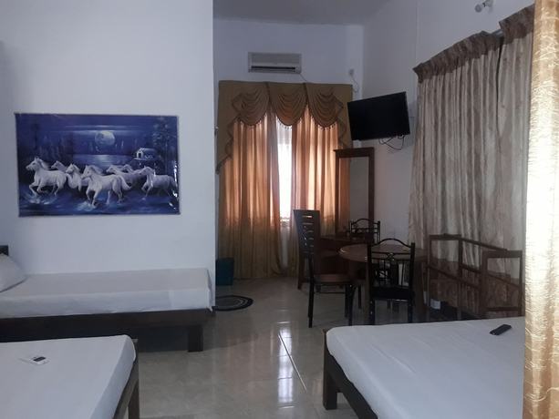 Imagen de la habitación del Hotel Blue Whale. Foto 17