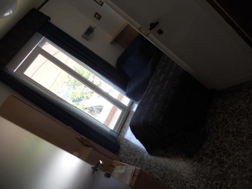 Imagen de la habitación del Hotel BlueColors. Foto 8