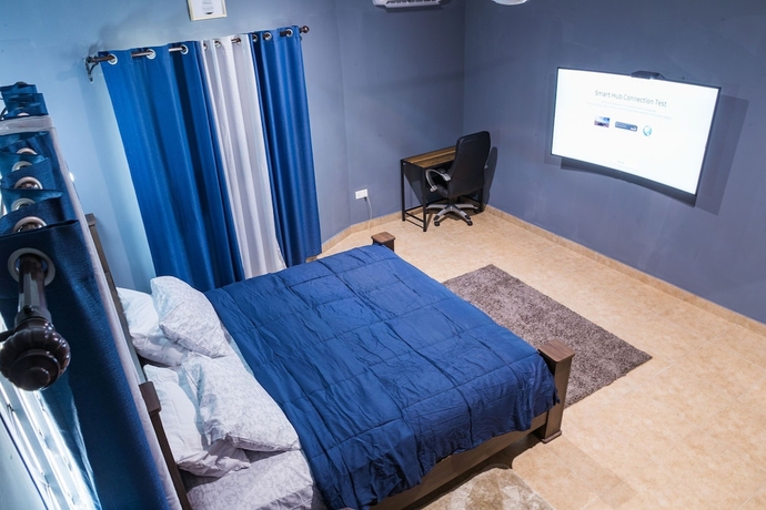 Imagen de la habitación del Hotel BlueGreen Guest House. Foto 5