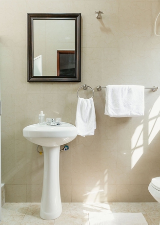 Imagen de la habitación del Hotel BlueGreen Guest House. Foto 11