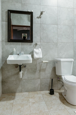 Imagen de la habitación del Hotel BlueGreen Guest House. Foto 12