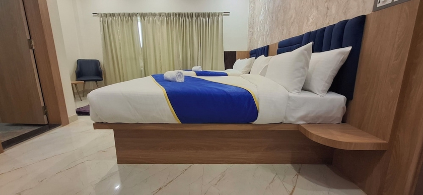 Imagen de la habitación del Hotel BlueNeck Ayodhya-Near ShriRam Mandir. Foto 9