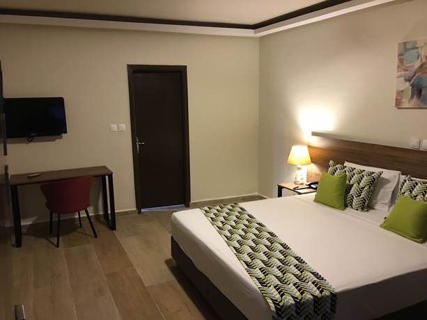 Imagen de la habitación del Hotel Bluebay Hôtel Abidjan. Foto 4