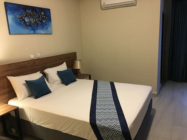 Imagen de la habitación del Hotel Bluebay Hôtel Abidjan. Foto 5