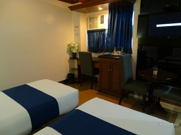 Imagen de la habitación del Hotel Blueberry Tourist. Foto 21