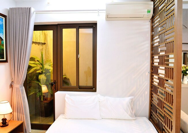 Imagen de la habitación del Hotel Bluehome. Foto 12