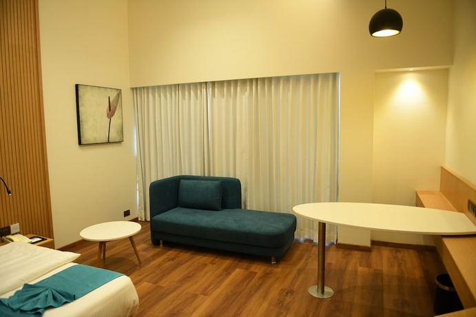 Imagen de la habitación del Hotel Blueivy. Foto 11