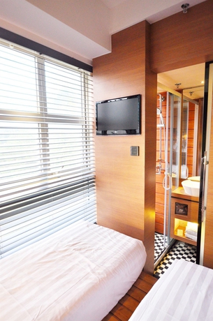 Imagen de la habitación del Hotel Bluejay Residences. Foto 9