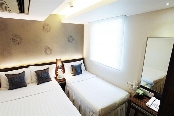 Imagen de la habitación del Hotel Bluejay Residences. Foto 10