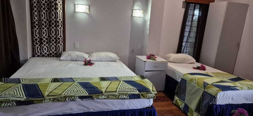 Imagen de la habitación del Hotel Bluelight Village. Foto 5
