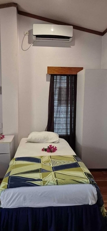 Imagen de la habitación del Hotel Bluelight Village. Foto 6