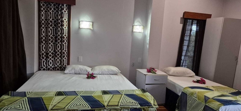 Imagen de la habitación del Hotel Bluelight Village. Foto 8