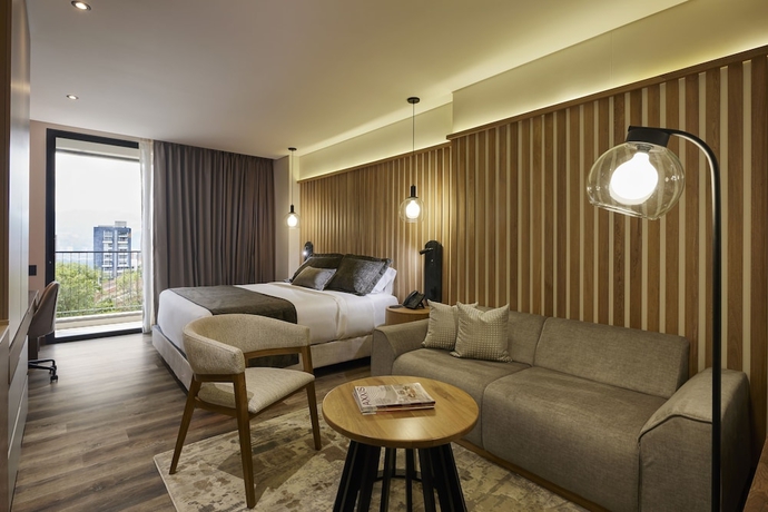Imagen de la habitación del Hotel Blues Suites Medellin. Foto 12