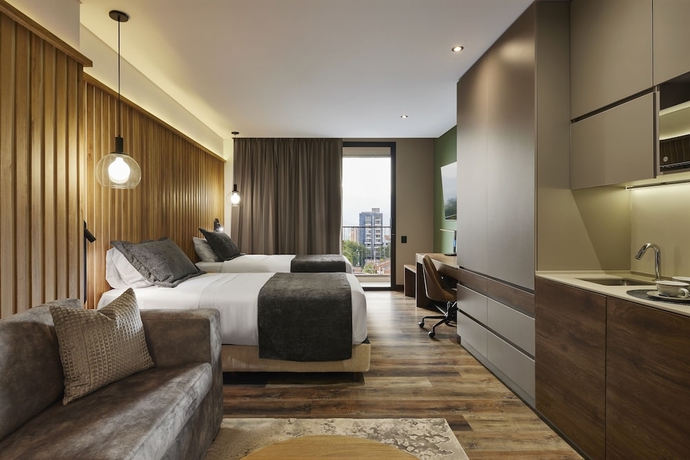 Imagen de la habitación del Hotel Blues Suites Medellin. Foto 16