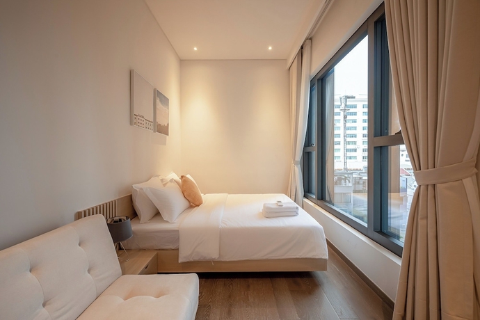 Imagen de la habitación del Hotel Bluesky MarQ Luxury Vaccation. Foto 14