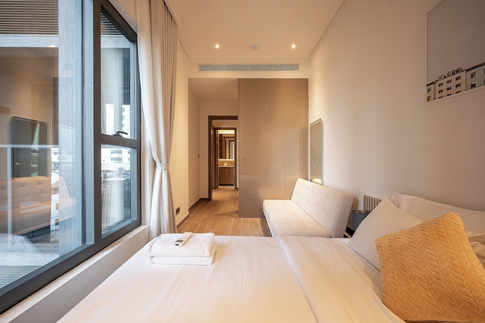Imagen de la habitación del Hotel Bluesky MarQ Luxury Vaccation. Foto 15